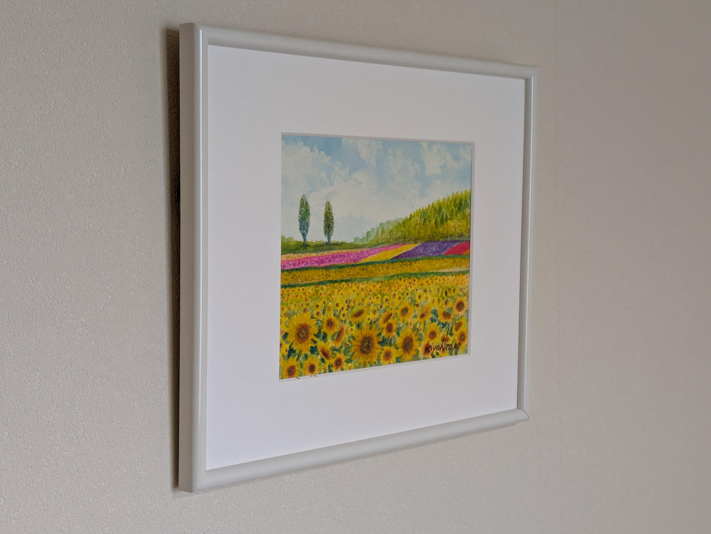 ひまわり畑とポプラ